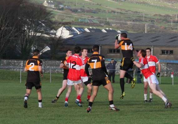 Kieran Donaghy, Austin Stacks, reaches highest for the ball in the 2011 Division 1 Co. League Final against Dingle