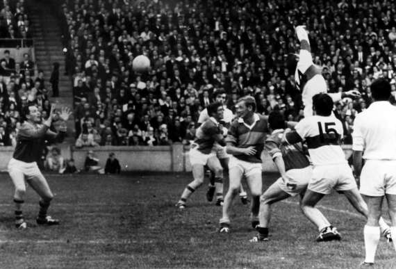 Johnny Culloty gathers the ball during the 1958 All Ireland Semifinal against Derry