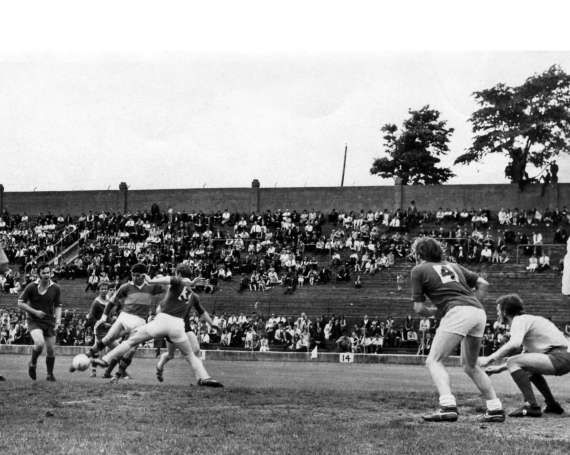 Mick O Dwyer shoots for goal in a Munster Final against Cork