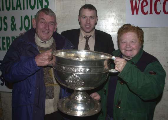 Seamus Moynihan with his parents and Sam Maguire