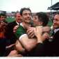 Tommy Doyle celebrates with manager Mick O'Dwyer after the 1986 Final